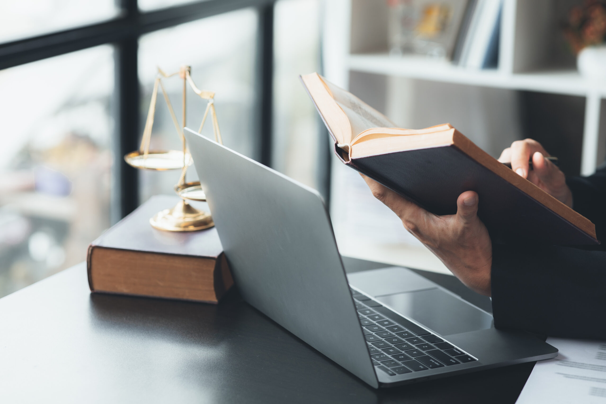 Lawyers read legal books defend their clients' cases, the lawyer