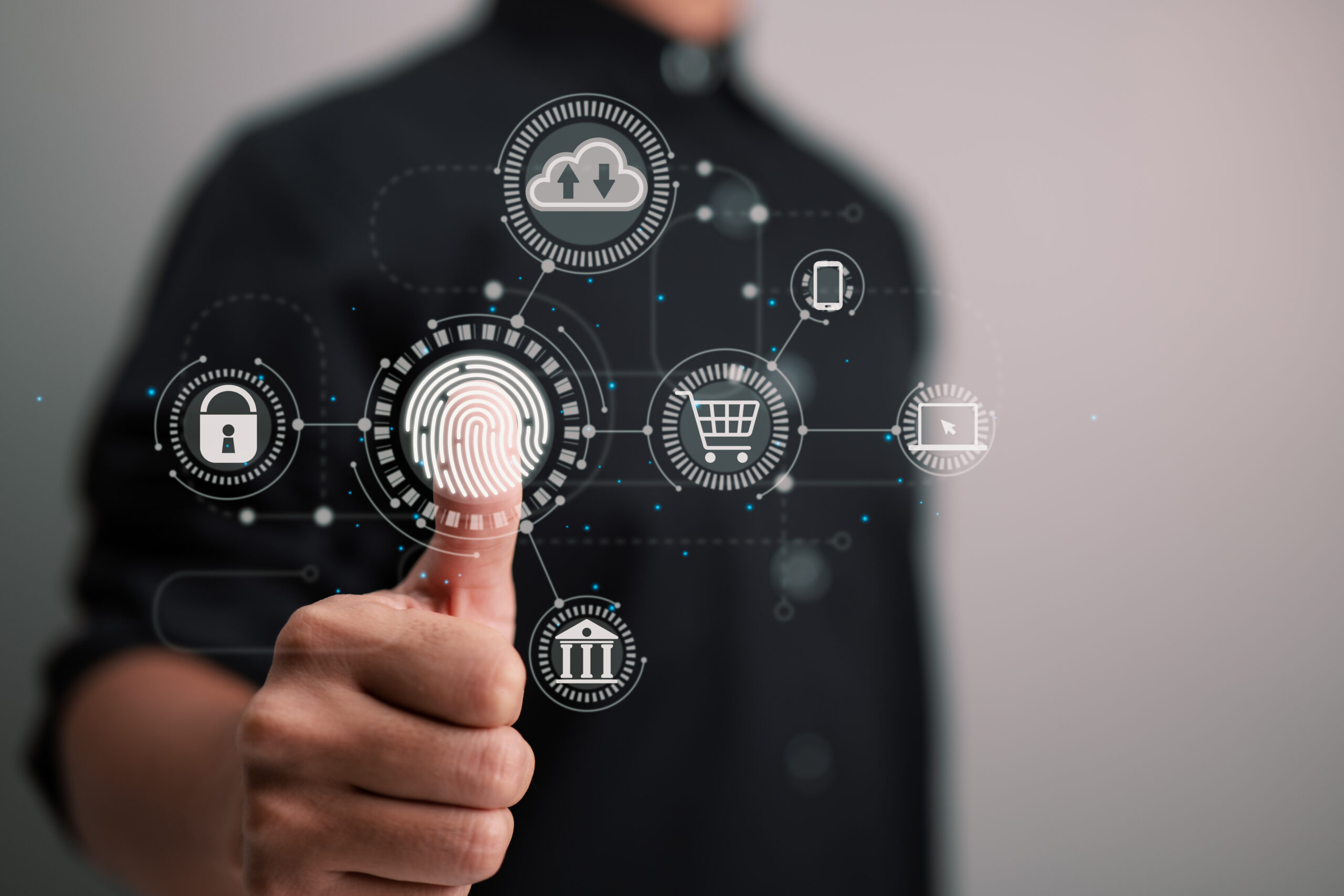 Online transactions, a businessman touching a fingerprint scanne